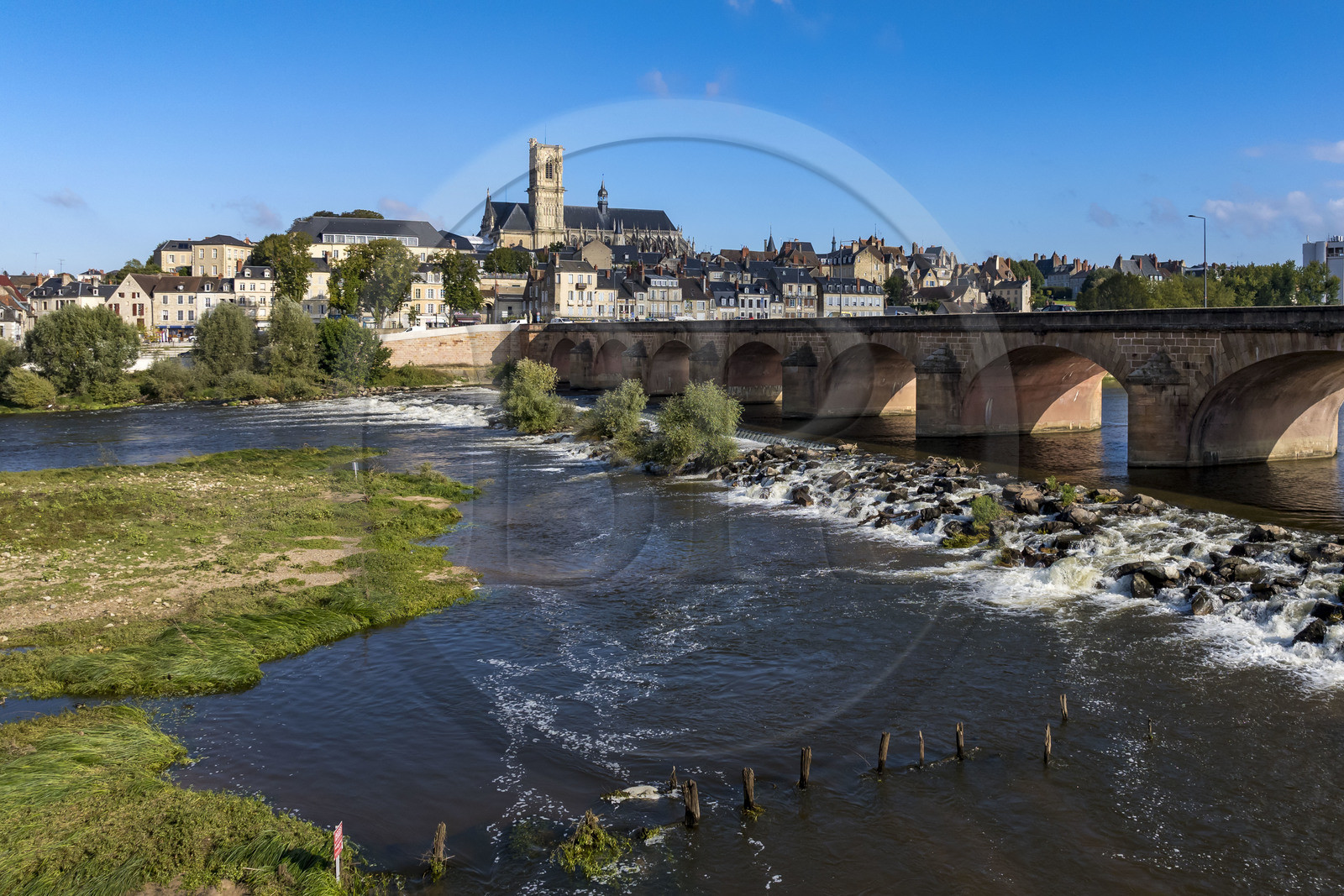 France, Nièvre, Nevers, the Loire downstream from the Pont de la Loire and the Saint-Cyr-et-Sainte-Julitte cathedral in the background (aerial view)