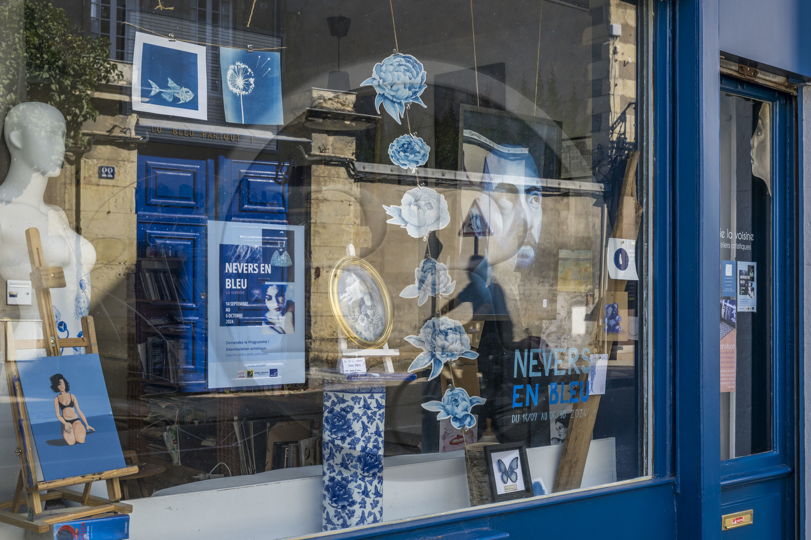 France, Nièvre, Nevers, window of the Atelier de la Voisine on rue de Nièvre, which is also participating in Nevers en Bleu