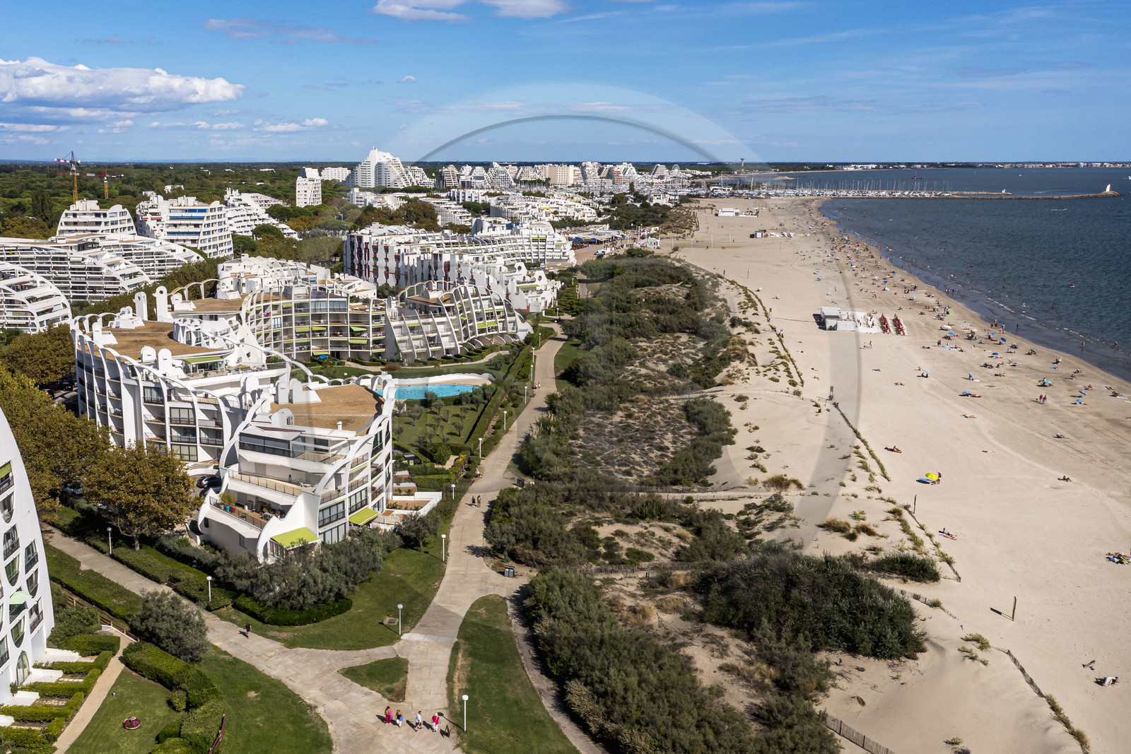 France, Herault, La Grande-Motte, labeled 20th century heritage, Couchant (setting sun) district west of the port and the beach (aerial view)