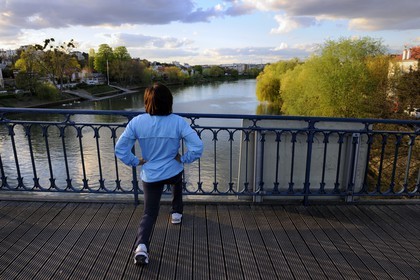 France, Val de Marne, the Marne riverside, jogger on the footbridge between Le Perreux-sur-Marne on the left and Bry-sur-Marne on the right