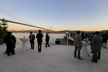 Turkey, Istanbul, Ortakoy District, Marmara Esma Sultan by GAD Global Architectural Development behind Ortakoy Mosque and Bosphorus Bridge in the background