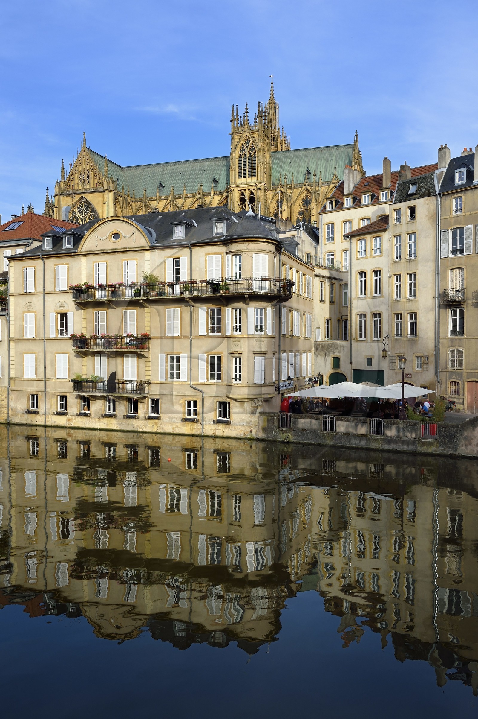France, Moselle, Metz, the canalized River Moselle banks with the Saint Etienne cathedral in the background