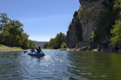 France, Ardeche, Balazuc, kayaks going down the Ardeche River between Balazuc and Pradons