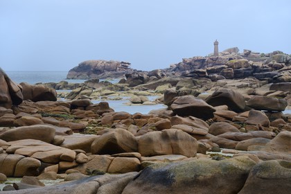 France, Cotes-d'Armor, Cote de Granit Rose (the Pink Granite coast), Tregastel, Pointe de Squewel and Mean Ruz Lighthouse at Ploumanach seen from the Renote island