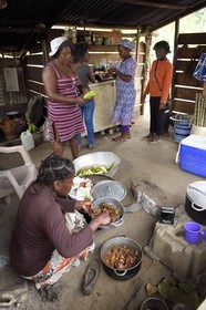 Gabon, Ogooue-Maritime Province, Omboue, Loango region, preparing food in the kitchen
