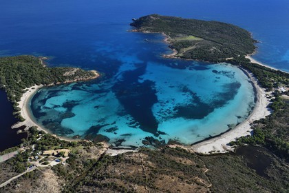 France, Corse du Sud, Bouche de Bonifacio Nature Reserve, Rondinara bay and beach (aerial view)