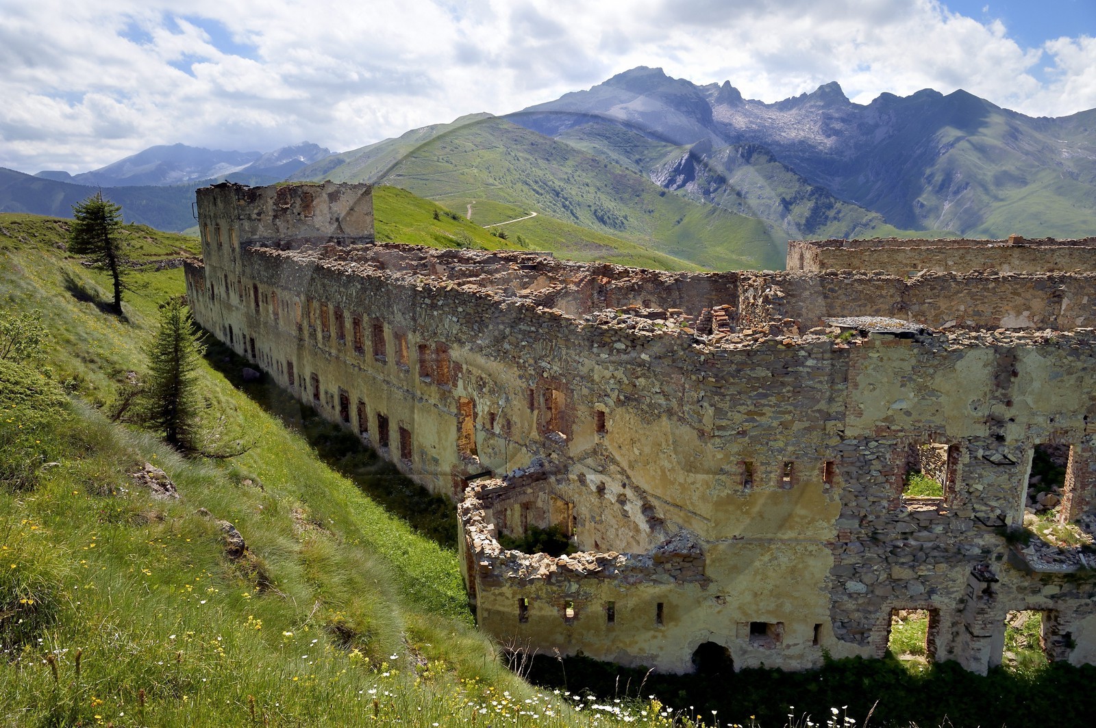 France, Alpes-Maritimes, the Central Fort quartering at the Col (pass) de Tende (1871m), fortifications built by the Italians in 1881 and the mountain of the Roche de l'Abisse in the background