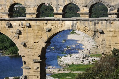 France, Gard, Pont du Gard listed as World Heritage by UNESCO, Roman aqueduct over Gardon River, canoeing