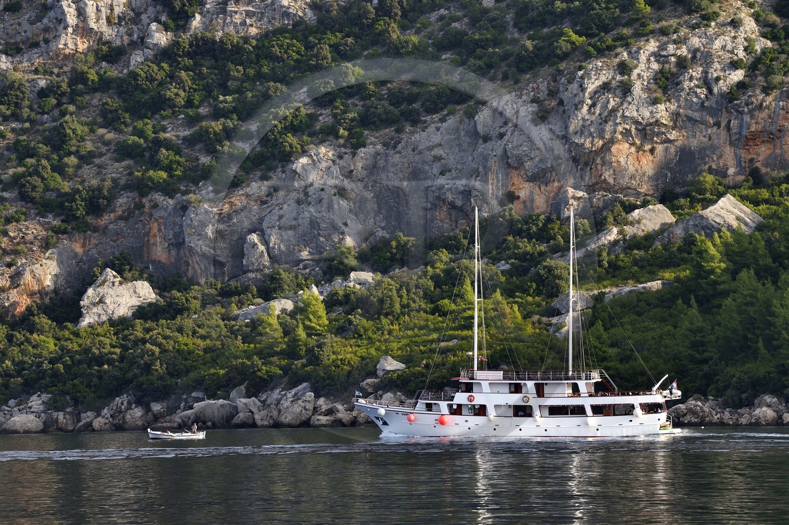 Croatia, Dalmatia, Dalmatian coast, cruise ship progressing in the strait between the peninsula of Peljesac (in the background) and the island of Korcula