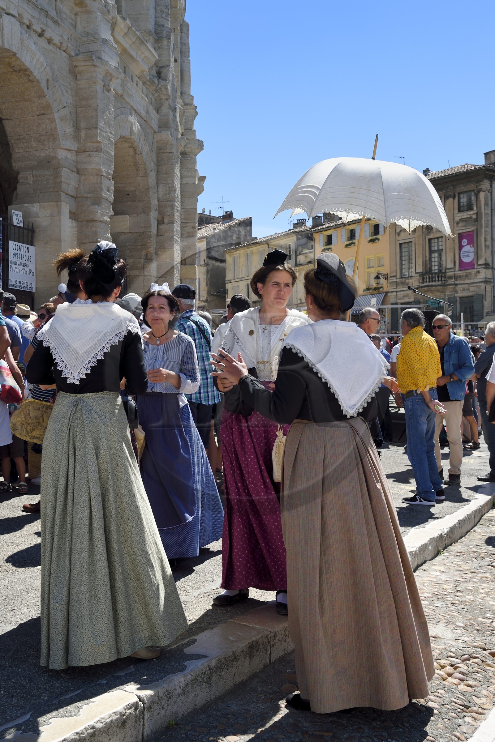 France, Bouches du Rhone, Arles, the course camarguaise of the Cocarde d'Or at the Arenas, Roman Amphitheatre 80-90 AD, Historical monument, listed as World Heritage by UNESCO, Arles inhabitants in traditional costume