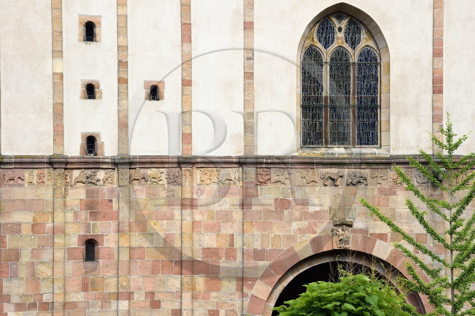 France, Bas Rhin, the Alsace Wine Route, Andlau, Benedictine abbey of Andlau founded in 880, abbey church Saint-Pierre-et-Saint-Paul (11th-18th centuries), 12th century bas-relief on the western Romanesque facade