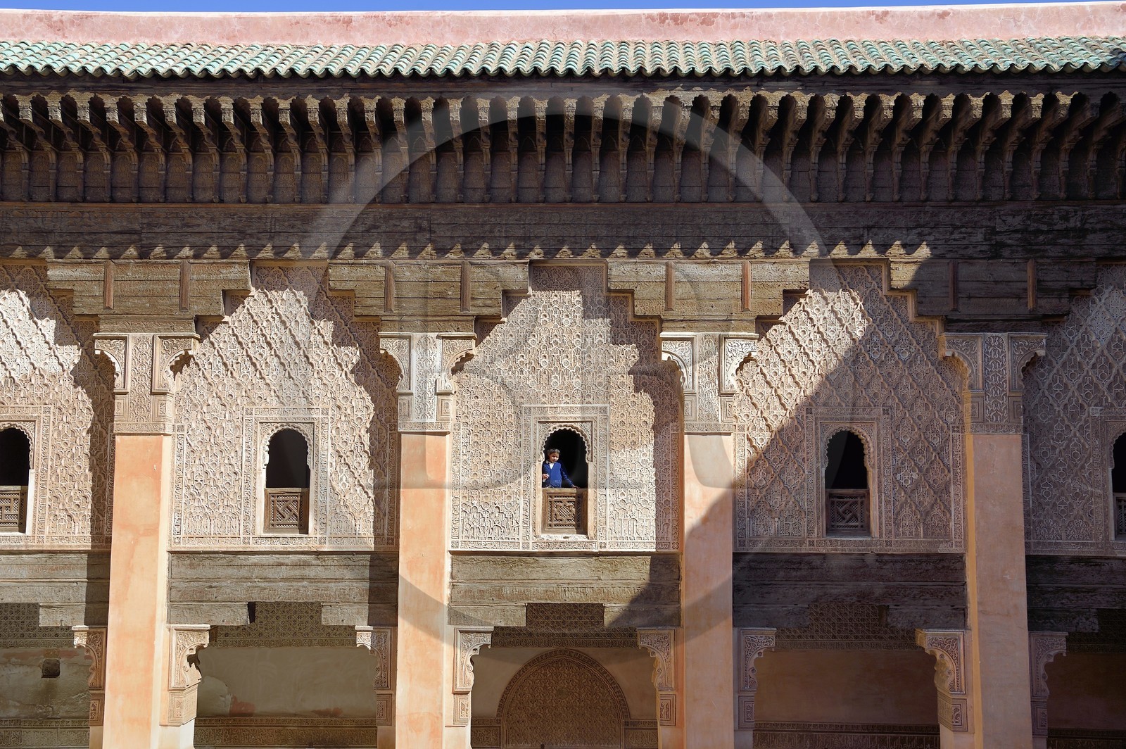 Morocco, High Atlas, Marrakech, Imperial city, Medina listed as World Heritage by UNESCO, Ali Ben Youssef Medersa (Koranic school), arched window with ornamental stucco work