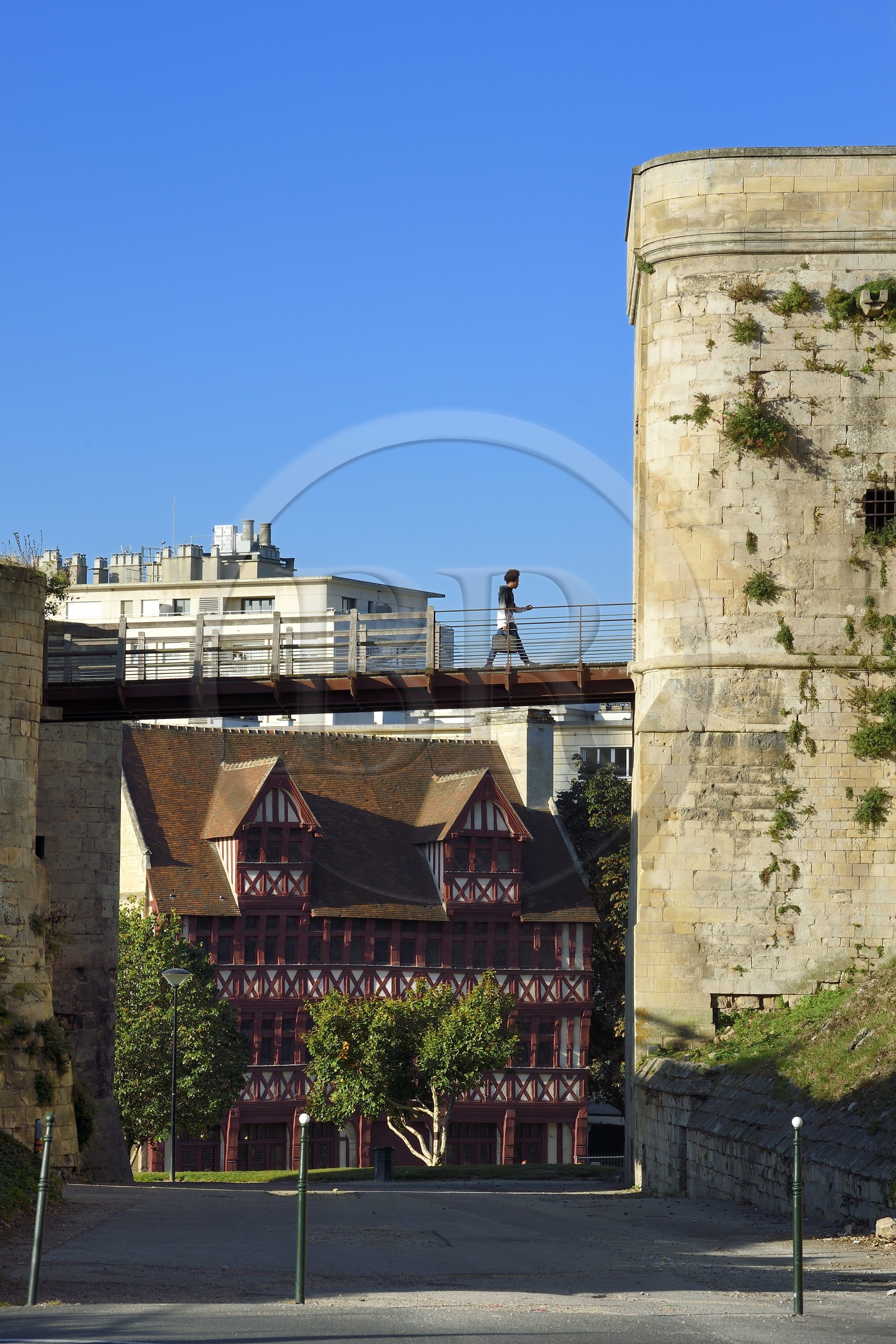 France, Calvados, Caen, the ducal castle of William the Conqueror, porte Saint-Pierre and the half-timbered house of Quatrans dating from 1460 rue de la Geole in the background