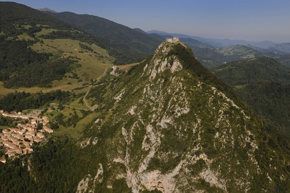 France, Ariege, Pays d' Olmes, Cathar Castle of Montsegur perched on a rock and the Pyrenees (aerial view)..