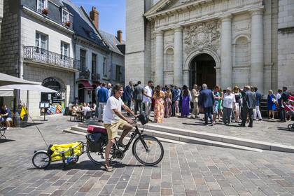 France, Maine-et-Loire, Loire valley listed as World Heritage by UNESCO, Saumur, bike with a trailer carrying camping equipment
