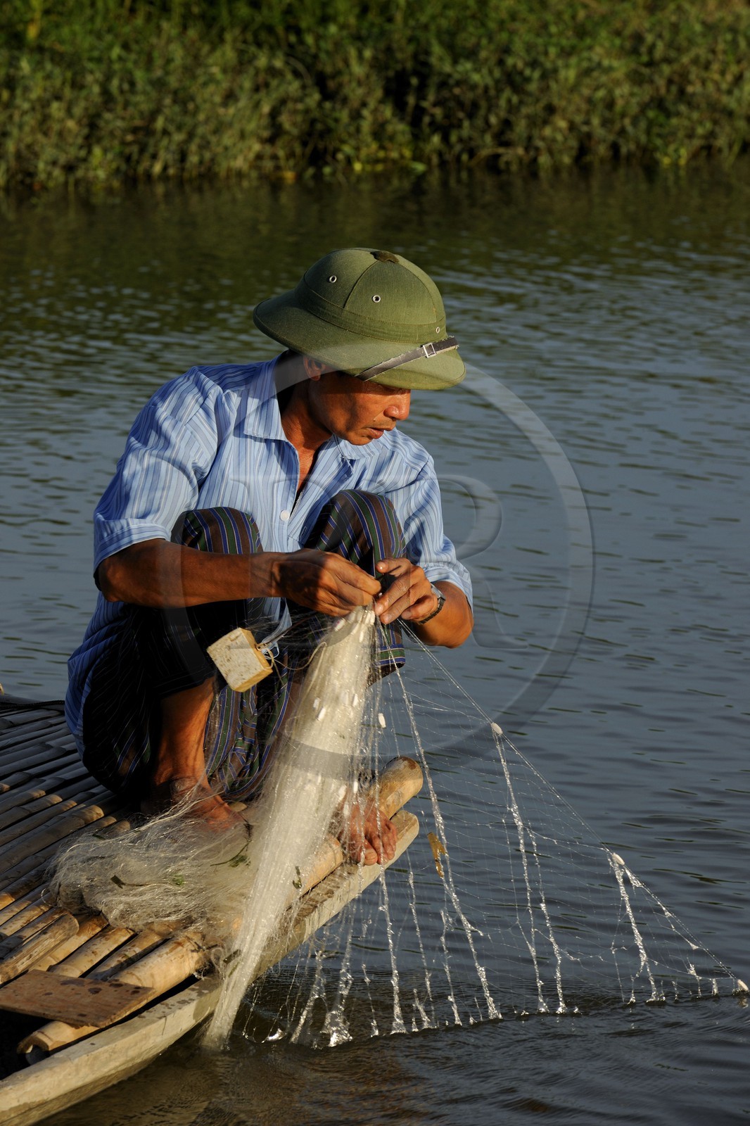 Vietnam, Ninh Binh province, insular village of Kenh Ga, fisherman