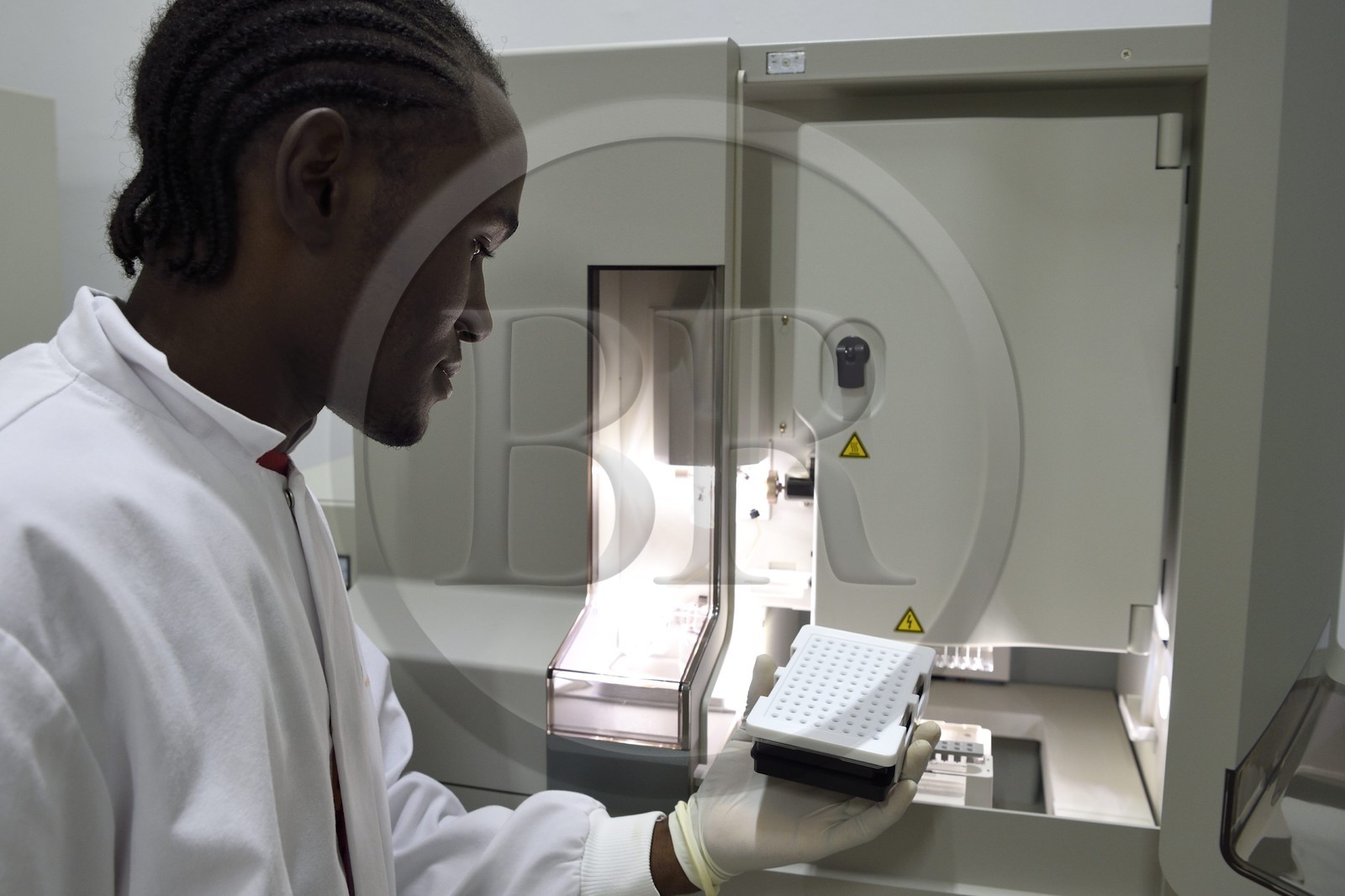 Namibia, Otjiwarongo, Cheetah Conservation Fund, research and education centre, Life Technologies Conservation Genetics Laboratory, Hafeni prepares to use the genetic analyzer