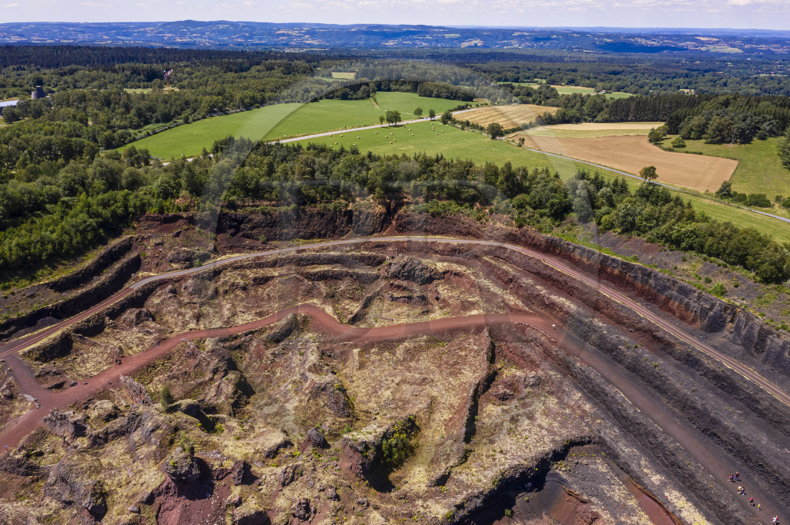 France, Puy de Dome, Parc Naturel Régional des Volcans d'Auvergne (regional nature park of Auvergne volcanoes), Chaine des Puys listed as World heritage by UNESCO, Saint Ours les Roches, Lemptegy volcano, a former pozzolan quarry that has become an educational site open to the public (aerial view)