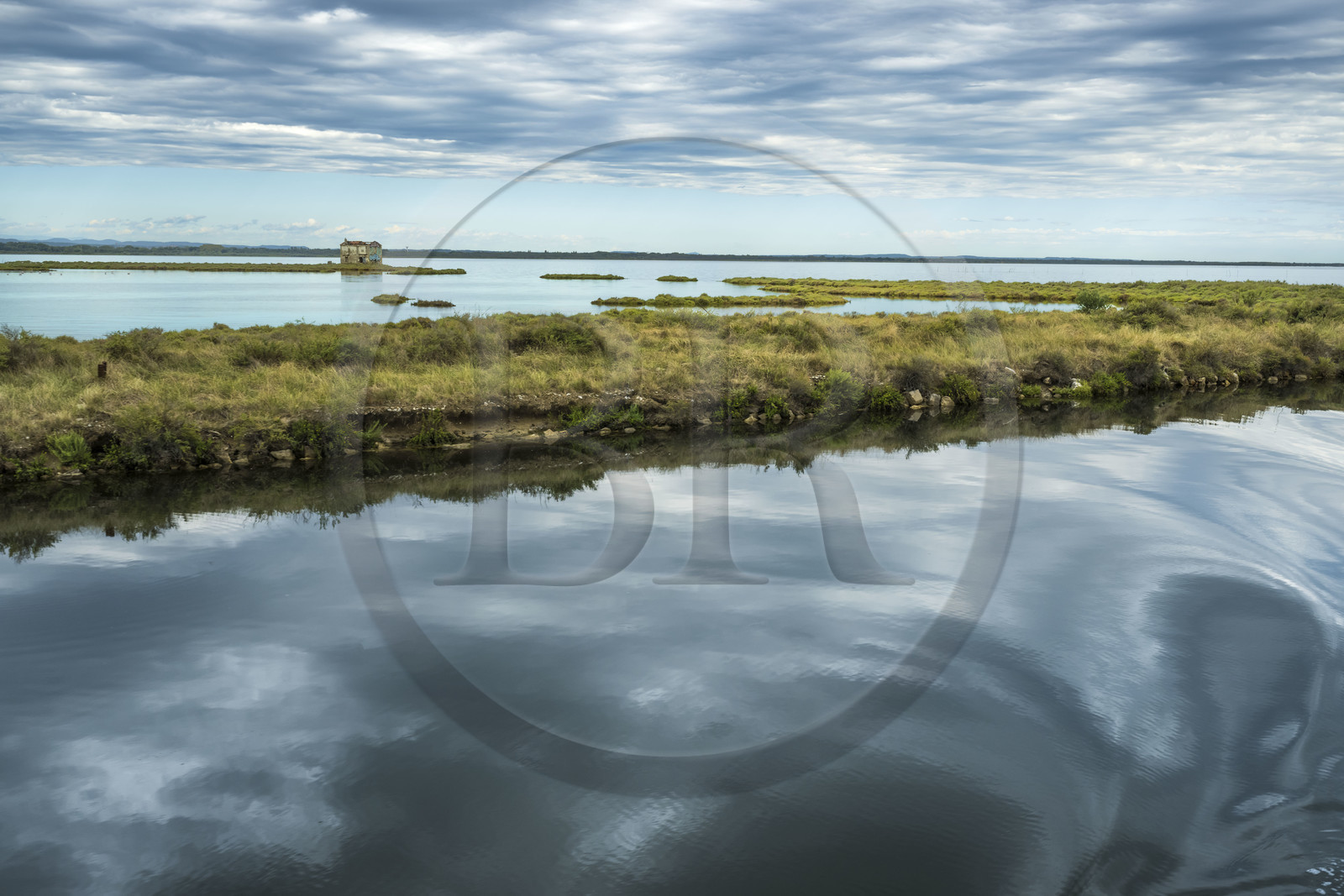 France, Herault, La Grande-Motte, the Rhone to Sète Canal (in the foreground) on the edge of the Etang de l'Or