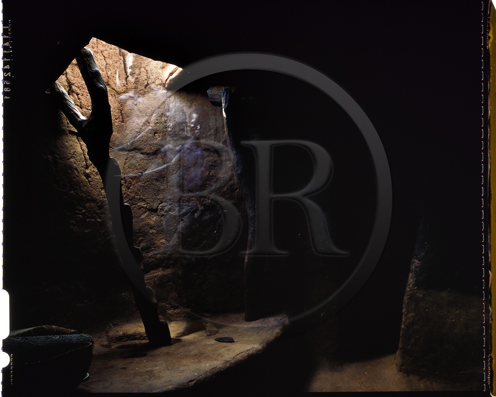 Burkina Faso, Poni province, Lobi land, Loropéni, inside a Lobi house, one of the many interior accesses to the terrace by a ladder carved from a tree trunk