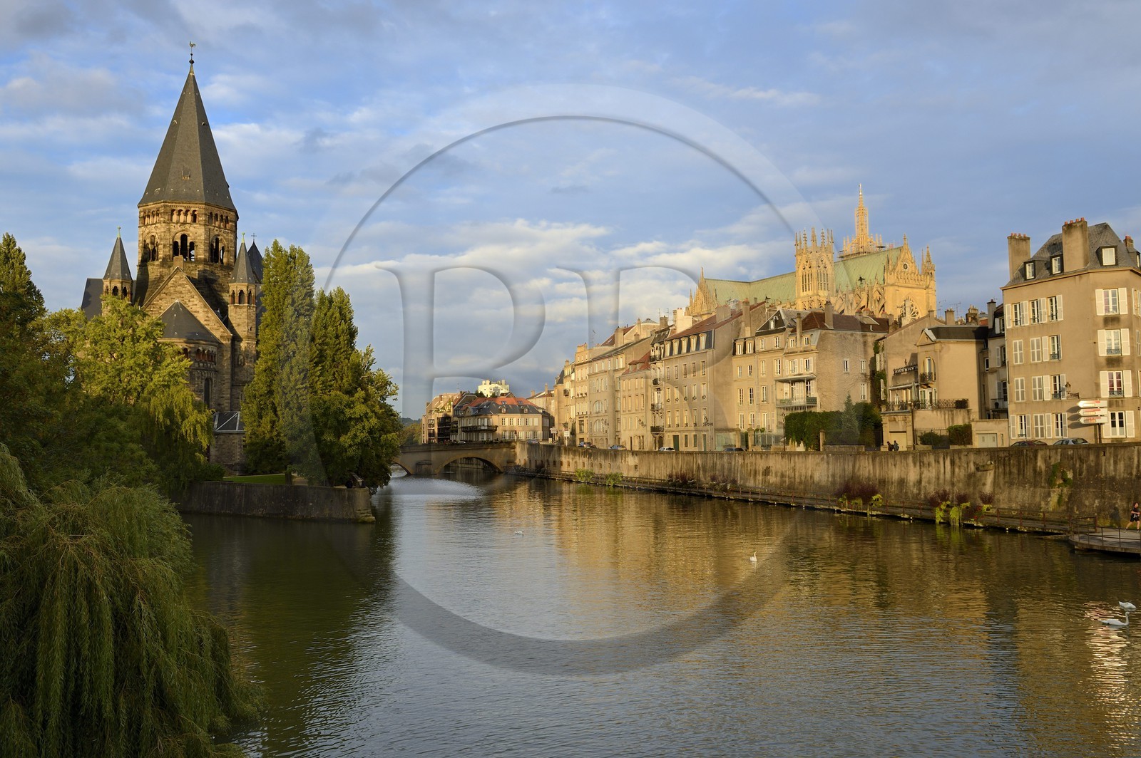 France, Moselle, Metz, Ile du Petit Saulcy, the Temple Neuf also called Eglise des allemands (the New Temple or Church of the Germans) reformed Prostestant Shrine and the canalized River Moselle banks with the Saint Etienne cathedral in the background right