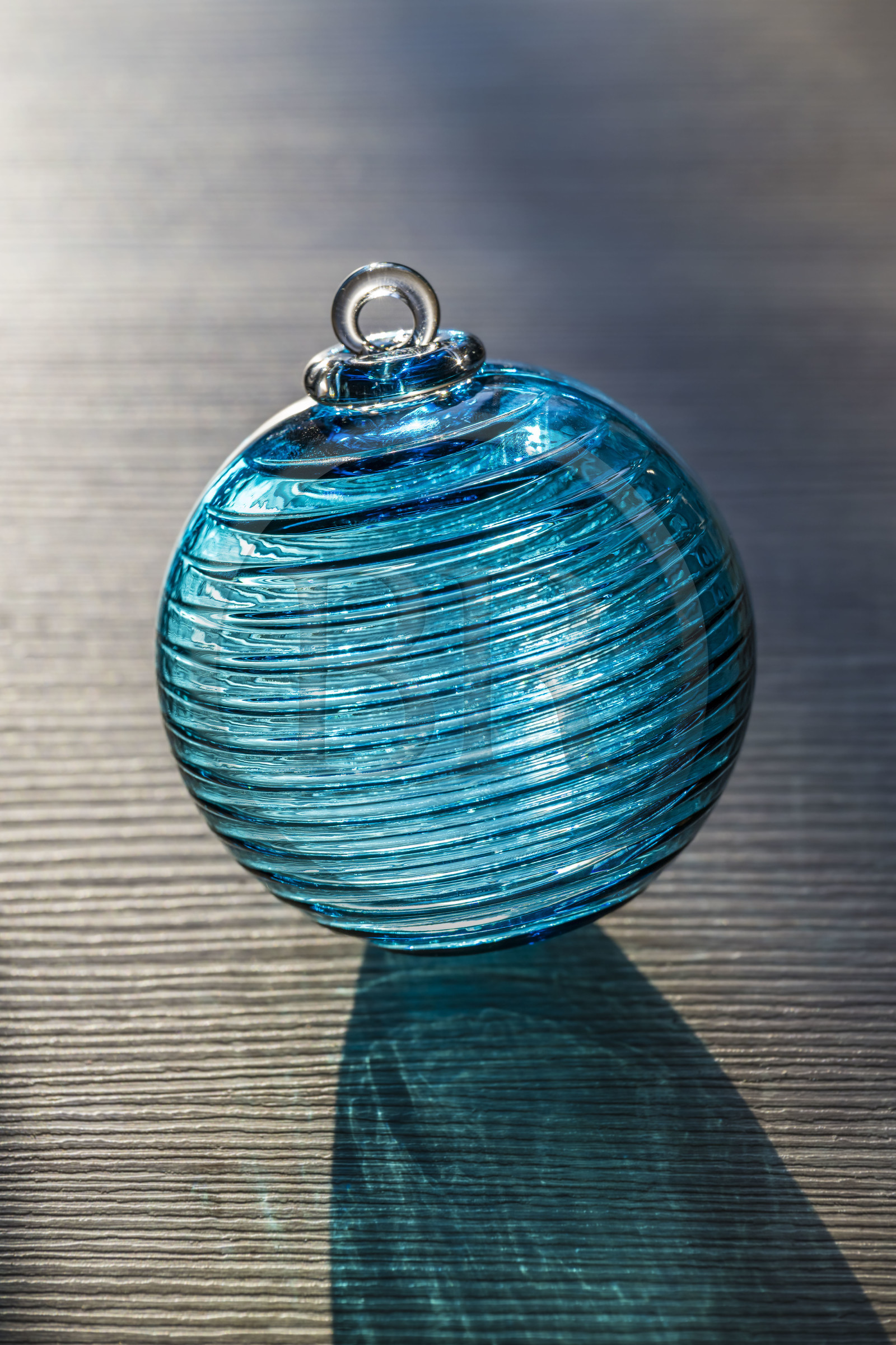 France, Moselle (57), Meisenthal, International Center for Glass Art (CIAV), handcrafted Grip Petrol Blue glass Christmas bauble from the 2025 collection