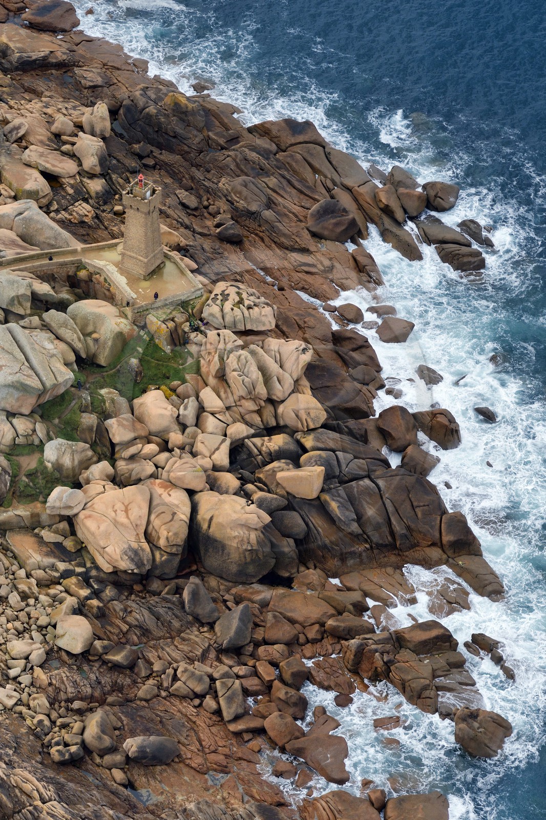 France, Cotes-d'Armor, Cote de Granit Rose (the Pink Granite coast), Perros Guirec, Ploumanach, Pointe de Squewel and Mean Ruz Lighthouse (aerial view)