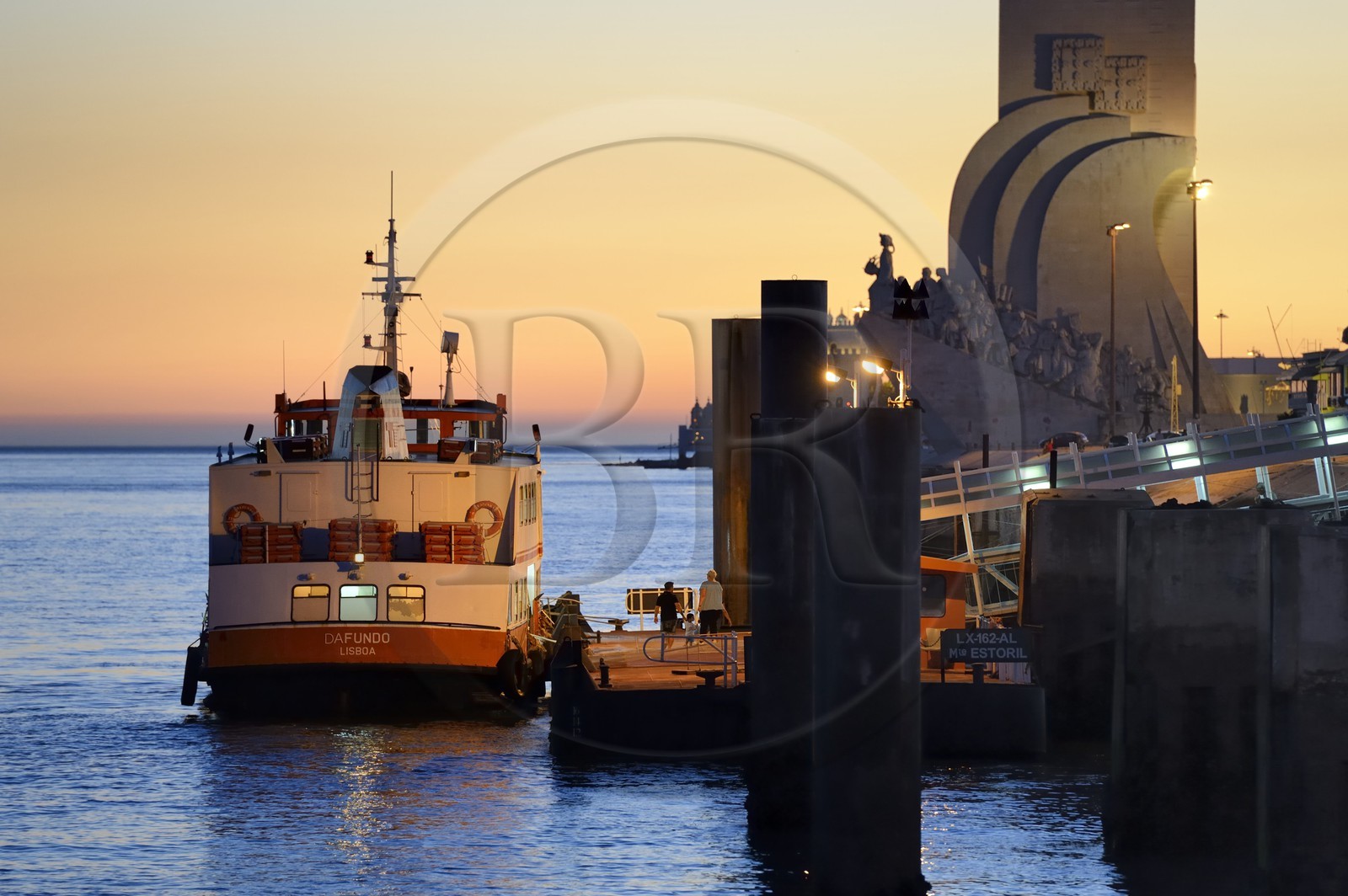 Portugal, Lisbon, Belem District, Padrao dos Descobrimentos (Monument to the Discoveries) dated 1960 at the mouth of the Tagus River, ferry at dock
