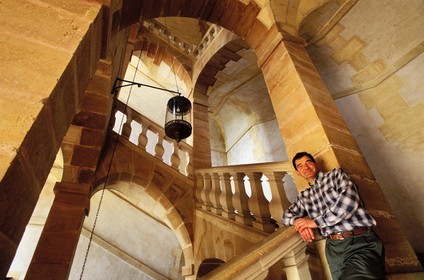 France, Saone et Loire, Mâconnais, castle of Cormartin, m. simonet lenglart standing on the monumental staircase