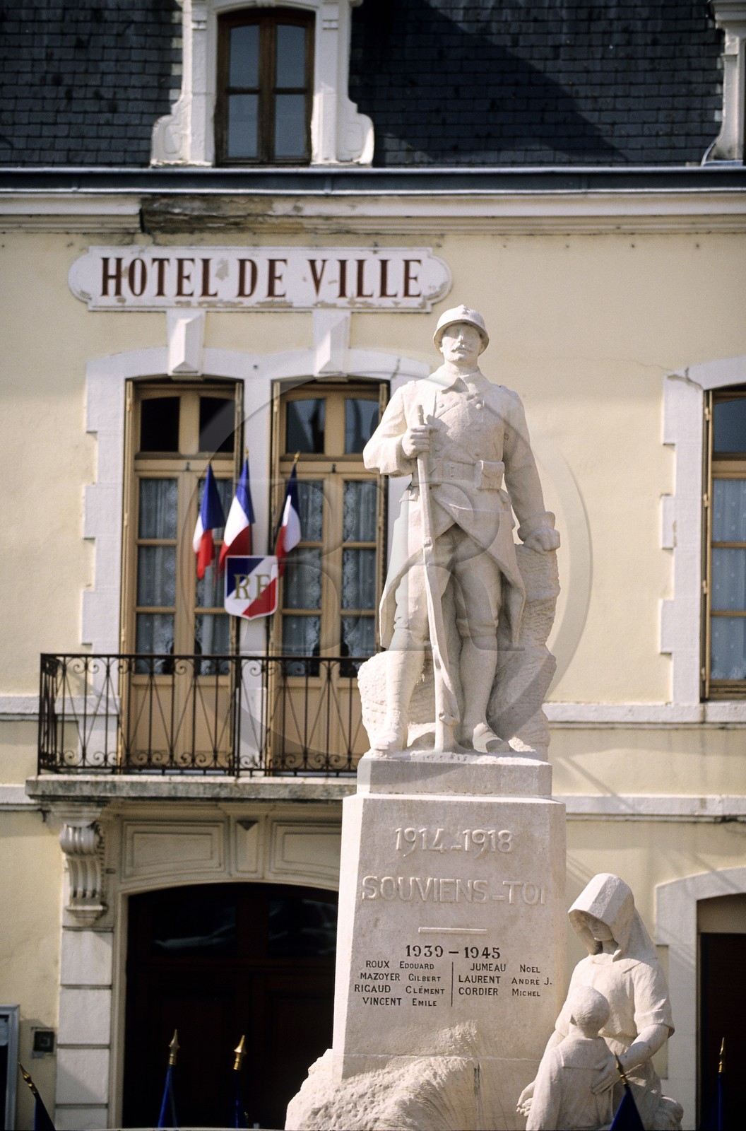 France, Saone et Loire, Cuisery village, a war memorial and the town hall