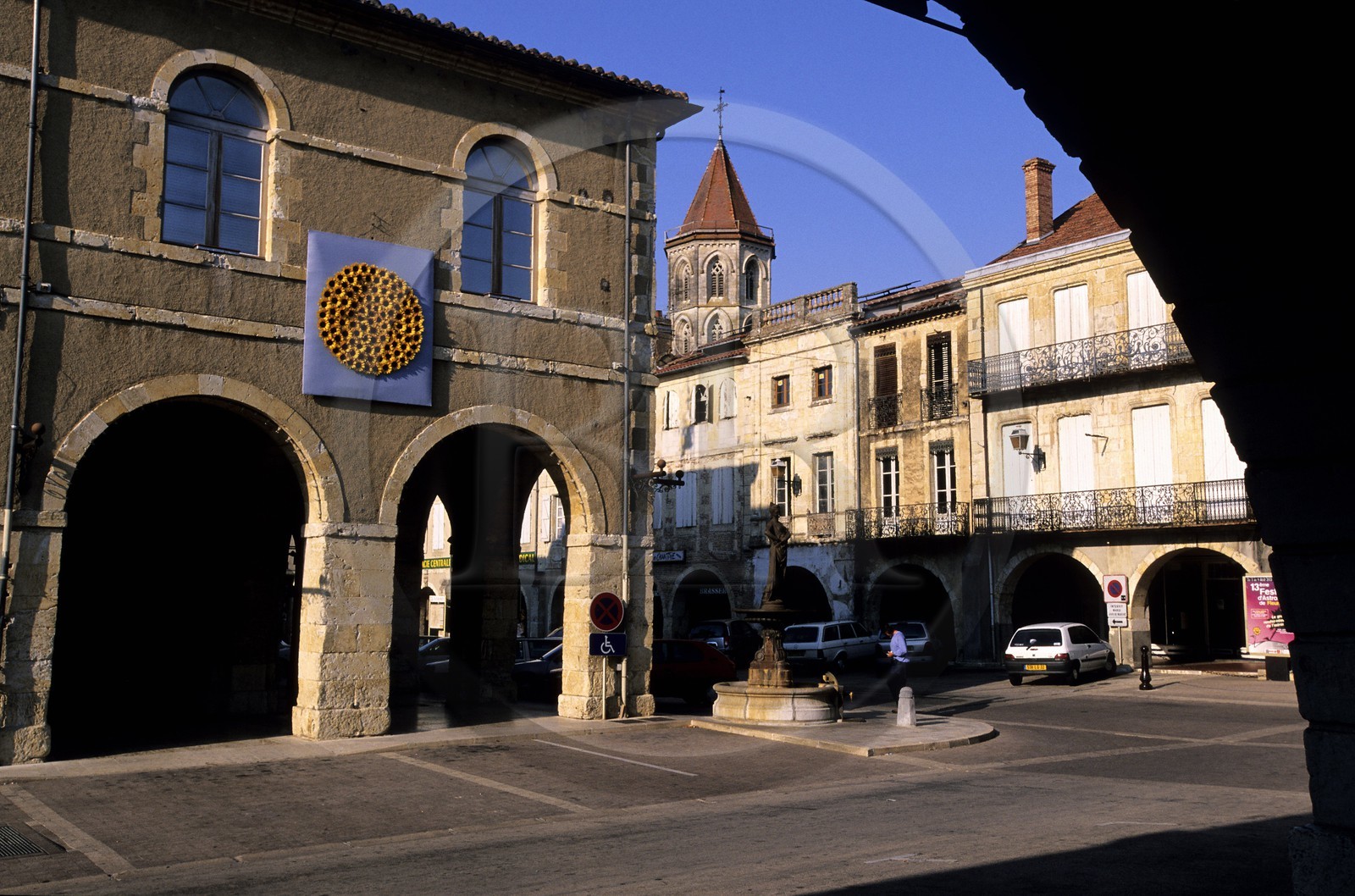 France, Gers, arcades of the covered market on the main square of the walled town of Fleurance