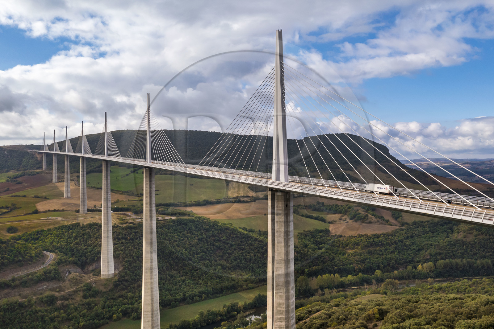 France, Aveyron, Grands Causses regional natural park, Millau, the Millau viaduct by architects Michel Virlogeux and Norman Foster, between the Causse du Larzac and the Causse de Sauveterre above the Tarn river (aerial view)