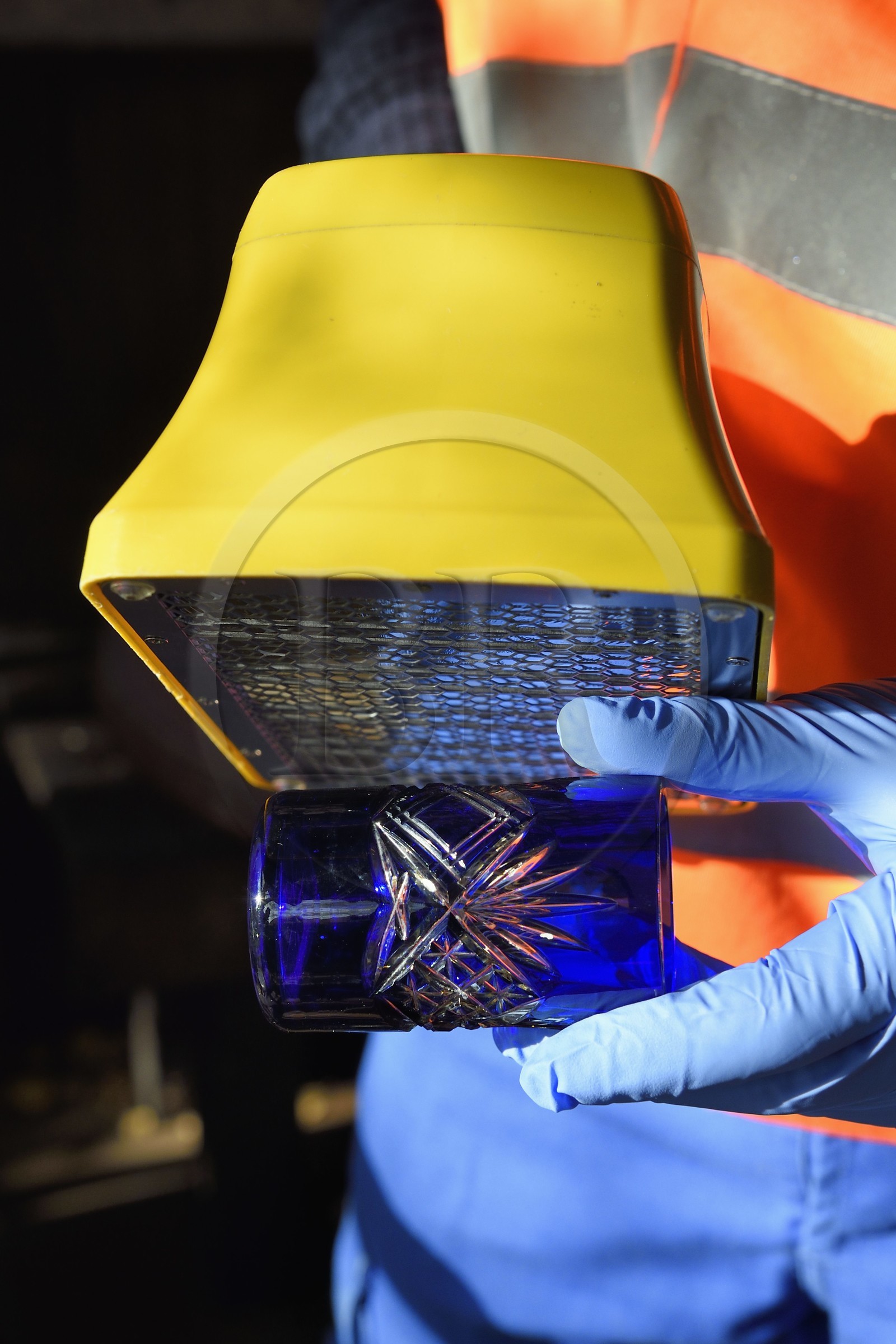 France, Bas-Rhin, Schiltigheim, intervention of engineers from the National Agency for the Management of Radioactive Waste (Andra) in a private home to remove radioactivity from a rare model of a century-old radium fountain, the contaminameter measures the level of residual radioactive contamination, here on the glass