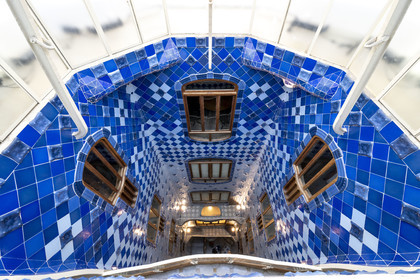 Spain, Catalonia, Barcelona, Eixample district, Passeig de Gracia, Casa Batllo by Catalan modernist architect Antoni Gaudi, UNESCO World Heritage site, courtyard, color gradient in the skylight