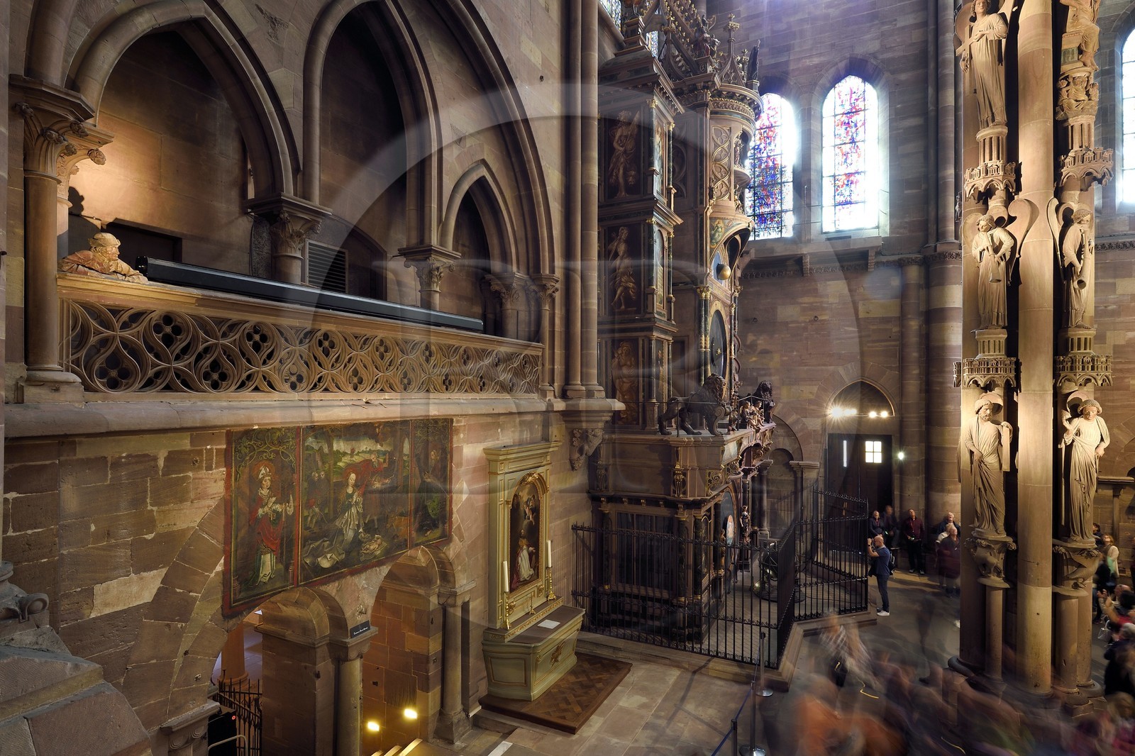France, Bas Rhin, Strasbourg, old town listed as World Heritage by UNESCO, Notre Dame Cathedral, south transept, the man leaning on the cantoria looking at the pillar of Angels and the astronomical clock
