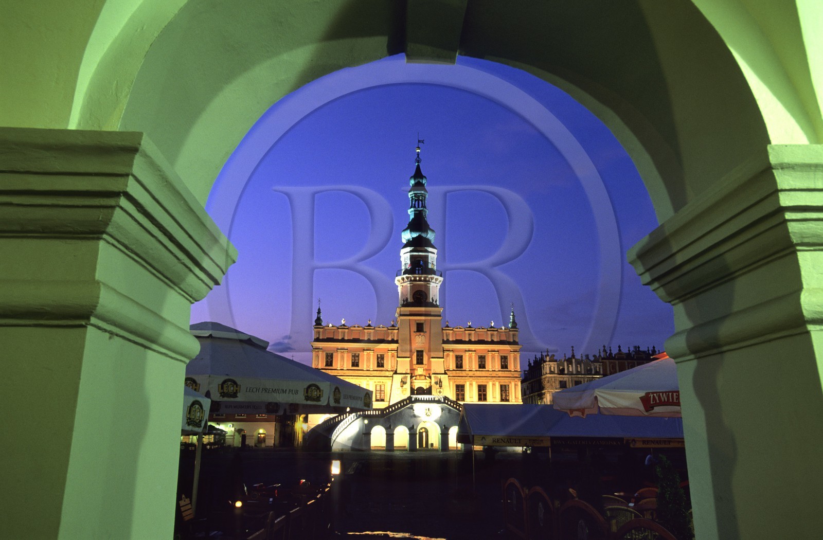 Poland, Lublin district, Renaissance city of Zamosc (UNESCO World Heritage Site), town hall seen from the arcades of the Market Square