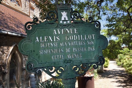 France, Var, Hyeres, street sign from the late 19th century and the Anglican church in the background
