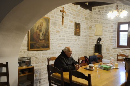 Croatia, Dalmatia, Dalmatian Coast, Franciscan Monastery on the island of Krapanj in front of Sibenik, brother and father John (Ivan Lelas) in the small refectory