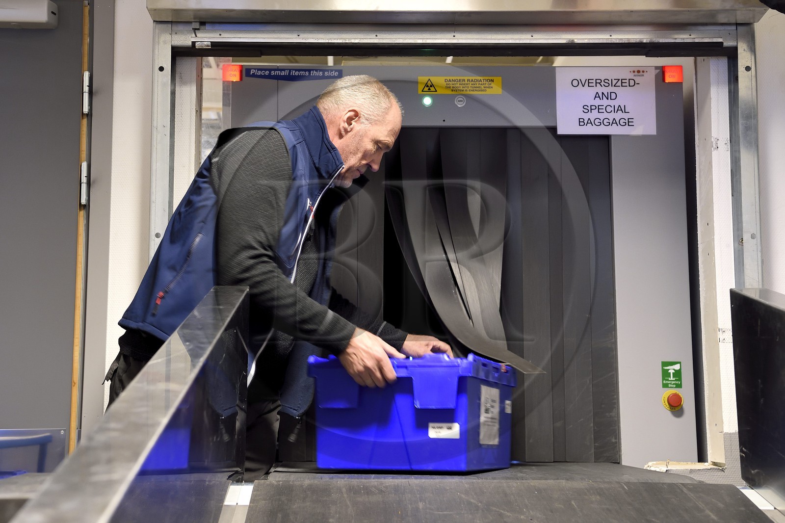 Norway, Svalbard, Spitzbergen, Longyearbyen, Svalbard Global Seed Vault (Seed Bank), arrival and scanning of seeds at the airport baggage claim area performed by NordGen