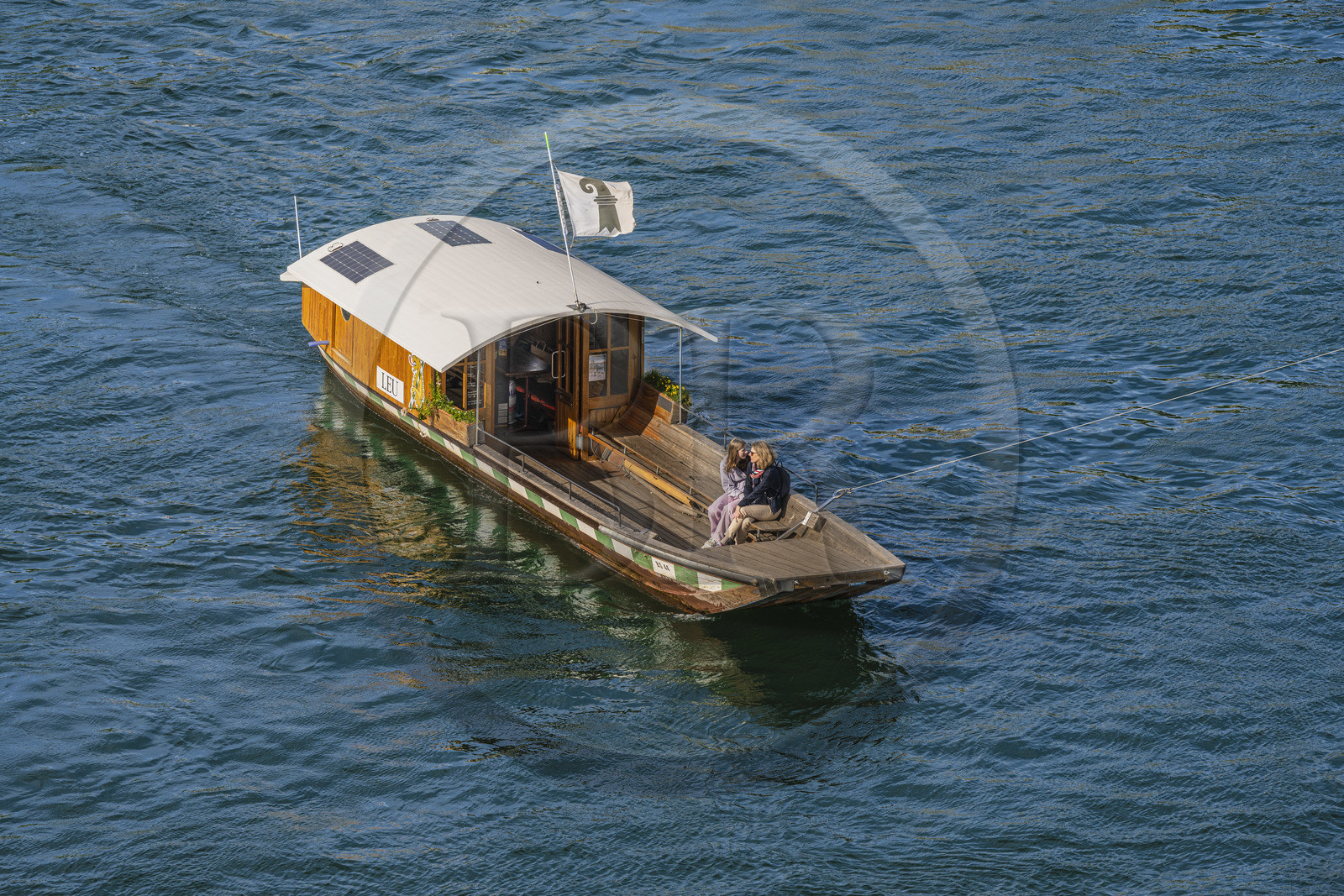 Switzerland, Canton Basel-Stadt, Basel, one of the four small ferries, the Fähri, in operation since the 19th century which connect the banks of the Rhine