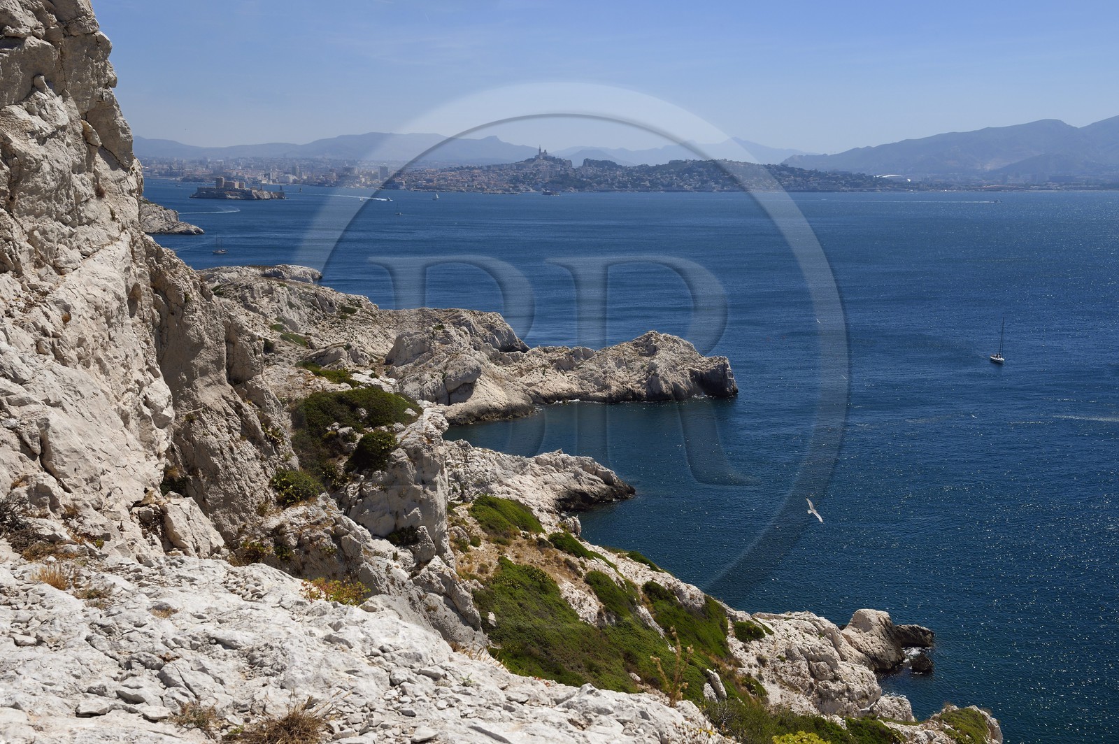 France, Bouches du Rhone, Marseille, Calanques National Park, archipelago of Frioul islands, Pomegues island and the Marseille skyline in the background