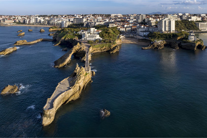 France, Pyrenees Atlantiques, Basque Country, Biarritz, the Rocher de la Vierge (Virgin rock) and the Port-Vieux beach on the right in the background (aerial view)