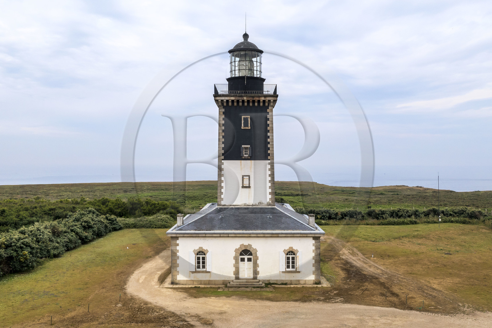 France, Morbihan, Groix Island, the Pointe de Pen-Men nature reserve, the Pen-Men lighthouse (aerial view)