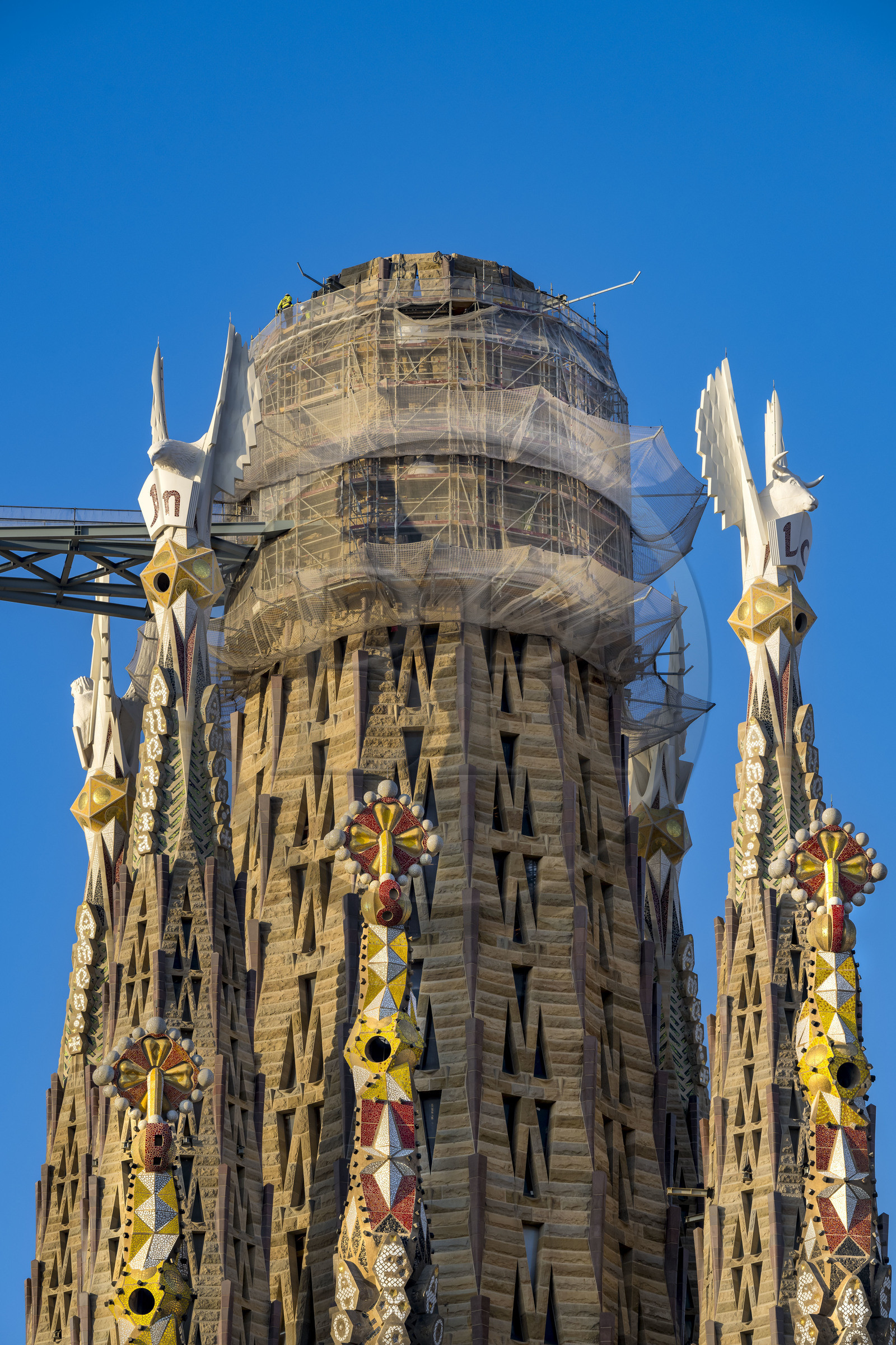 Spain, Catalonia, Barcelona, Eixample district, Sagrada Familia basilica by Catalan modernist architect Antoni Gaudi, listed as a UNESCO World Heritage Site, bell towers topped with pinnacles surrounding the central ciborium and the future central tower (Tower of Jesus Christ)
