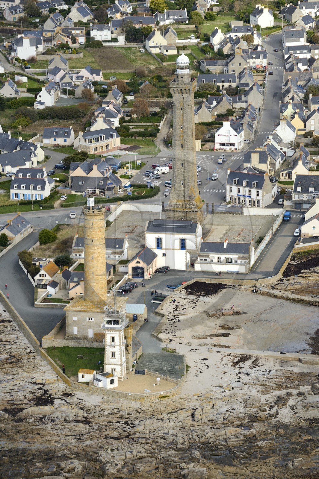 France, Finistere, Penmarch, Pointe de Penmarc'h, St Pierre Harbour, Eckmuhl Lighthouse, former lighthouse and semaphore in the foreground (aerial view)