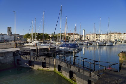 France, Charente-Maritime, La Rochelle, the wet dock of the Old Port and its lighthouse