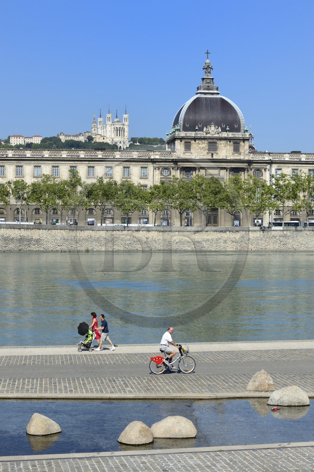 France, Rhone, Lyon, the banks of the Rhone river, the quay Victor Augagneur in the foreground, the hospital of Hotel Dieu and the Notre Dame de Fourviere Basilica, historical site listed as World Heritage by UNESCO, in the background
