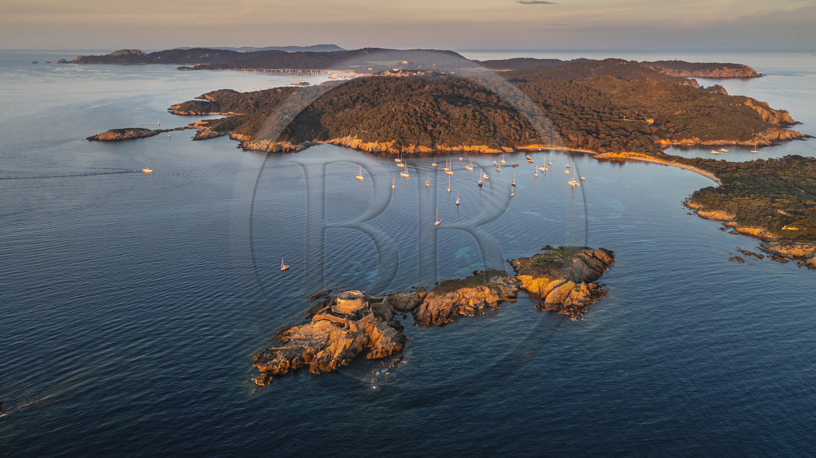 France, Var, Iles d'Hyeres, Parc National de Port Cros (National park of Port Cros), Porquerolles island, the 17th century Fort du Petit Langoustier on its island and Porquerolles in the background (aerial view)