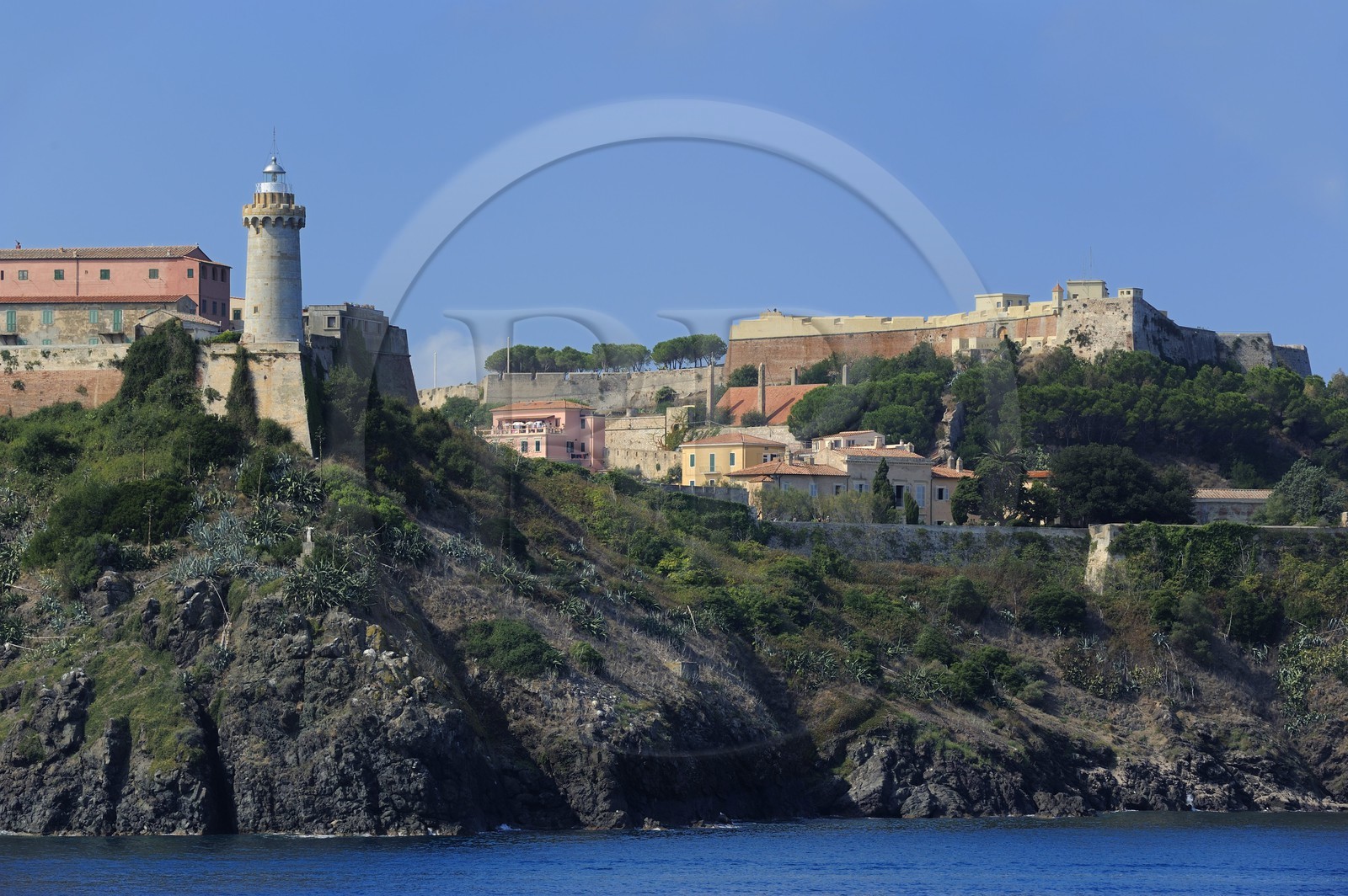 Italy, Tuscany, Elba Island, the Medici fortifications, the lighthouse Portoferraio and the house of Napoleon 1st in the Palazzina dei Mulini on the edge of the cliff