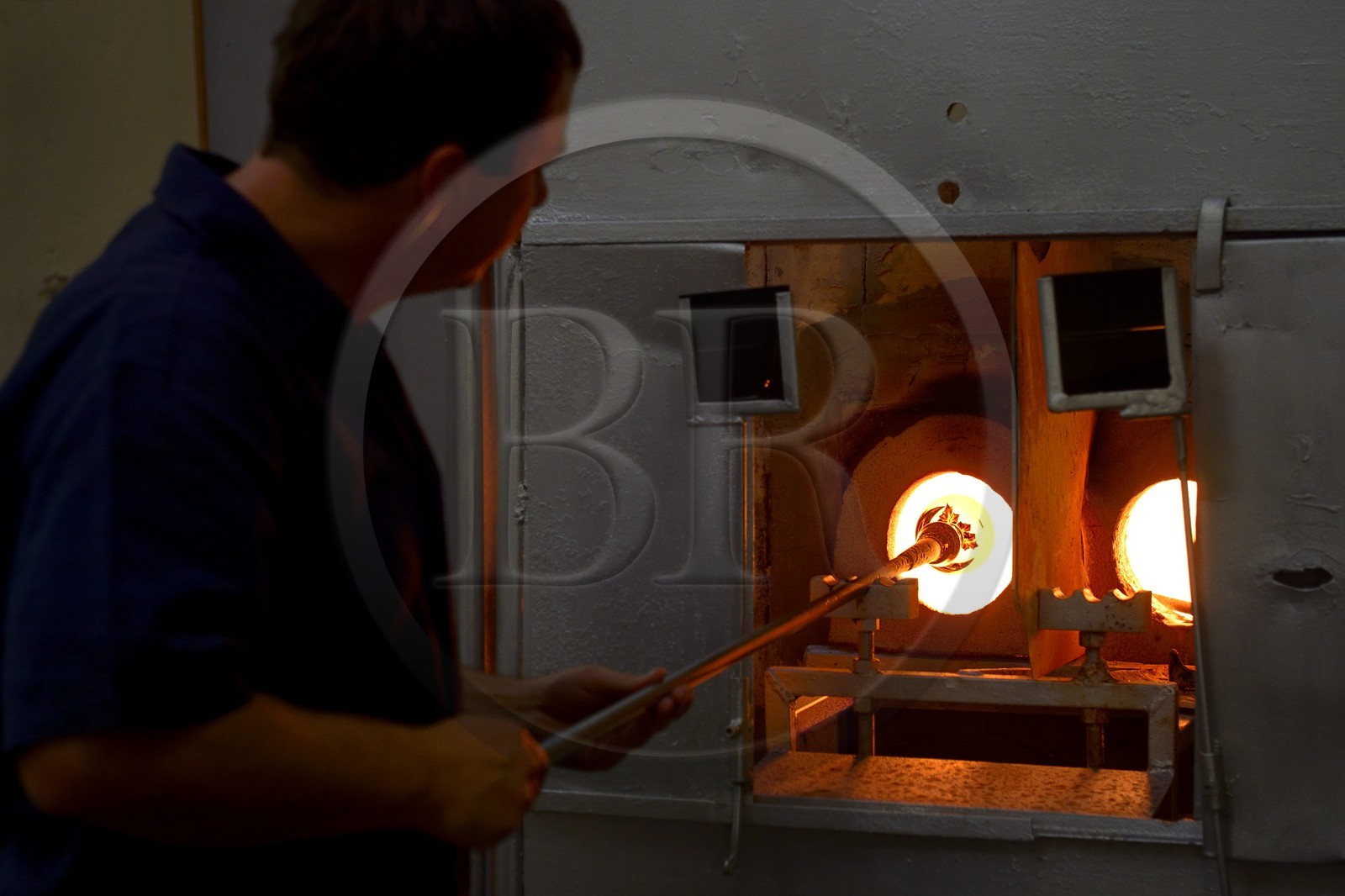 France, Moselle, Saint-Louis-les-Bitche, the Cristallerie Saint-Louis (Saint-Louis crystal glass manufacturer), shaping a hot crystal element, one of the many steps of the realization of a paperweight